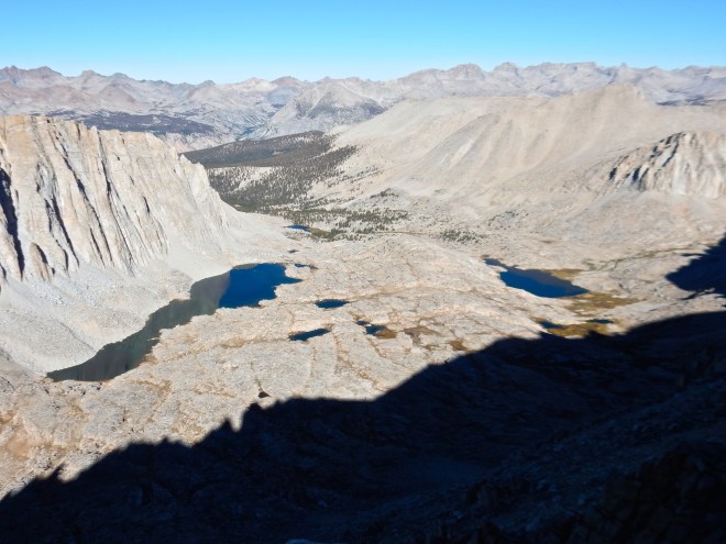 Guitar Lake and our little campsite tarn are way below us to the right
