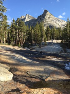 The stream opened up and flowed down slick granite.