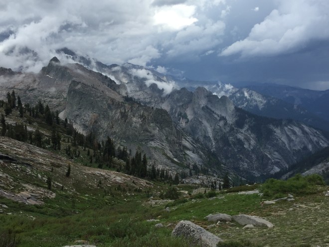 Hearing thunder rolling in the distance. We hurry to get off of the exposed pass.